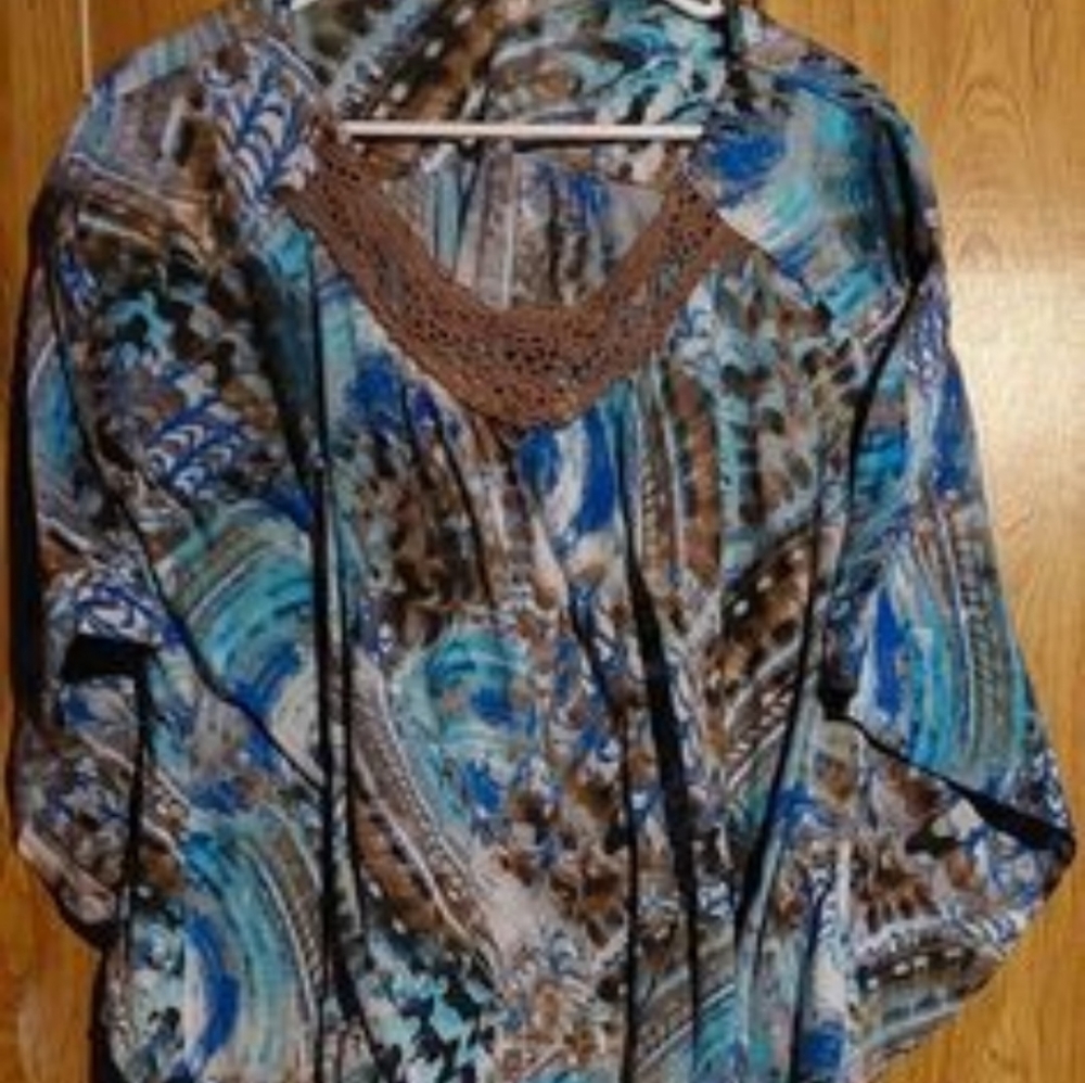 Blue cotton open arm shirt